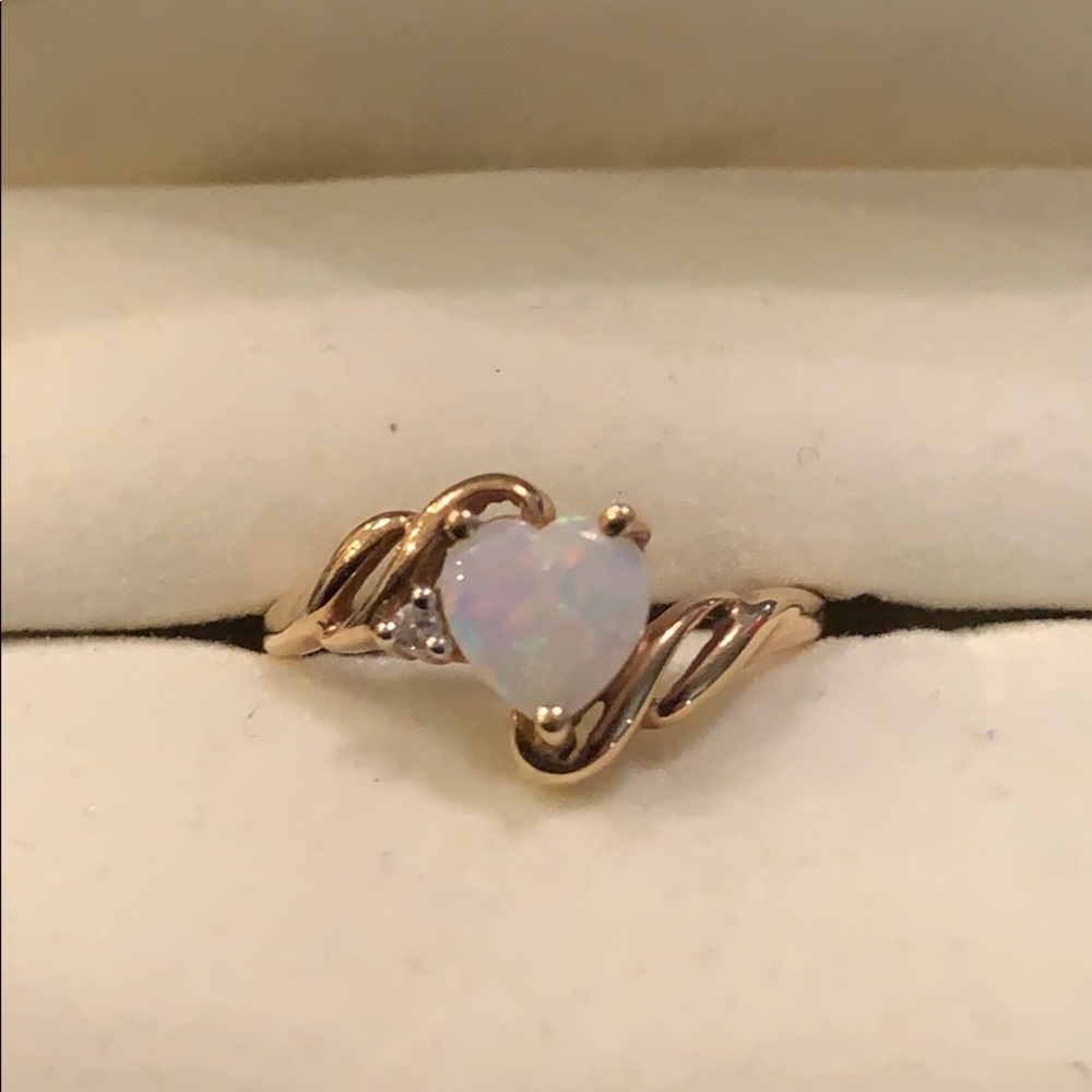 14k Opal Heart Gold Ring. One small diamond on it